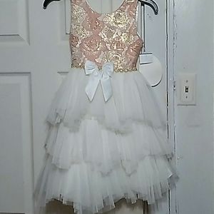 Girls dress coral, peachy, with gold design flower